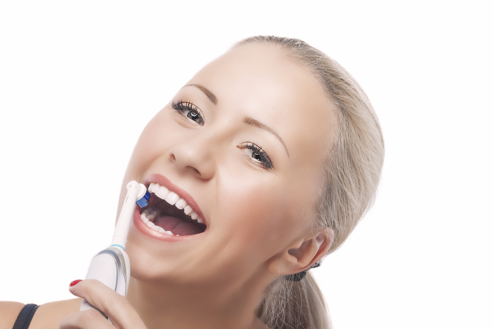 Dental-Health-Blond-Caucasian-Woman-Brushing-Her Teeth-with-Ele